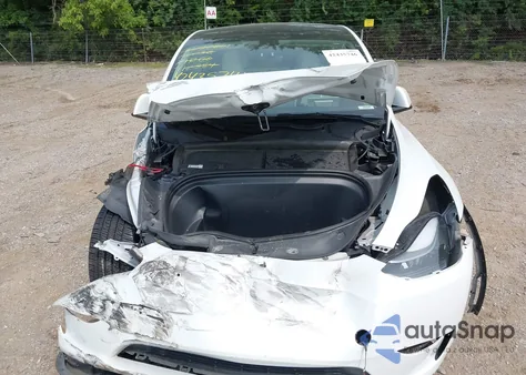 2023 Tesla Model Y Performance Dual Motor All-Wheel Drive z USA, uszkodzony, nr VIN 7SAYGDEF6PF712384